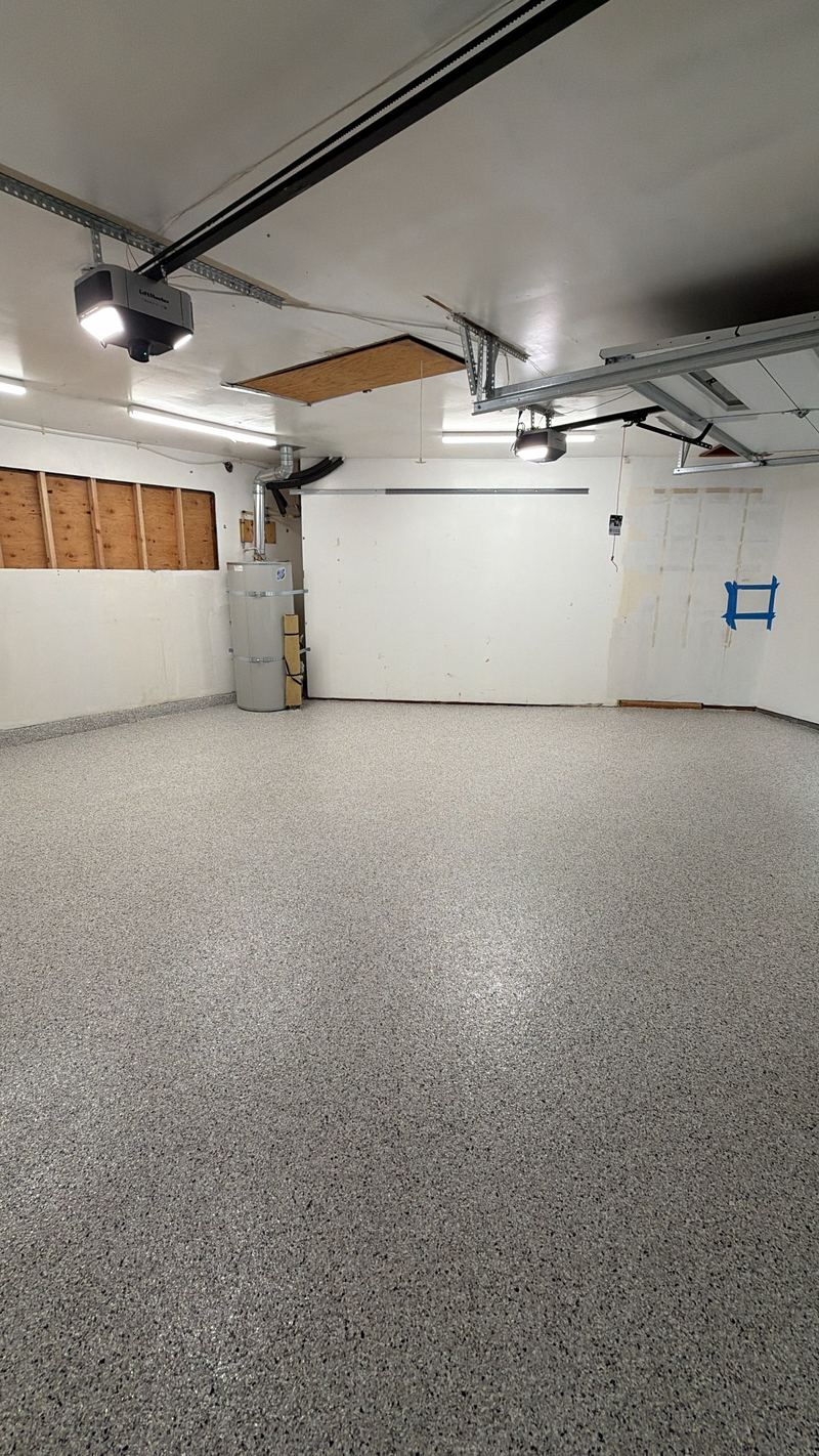 Empty gray flake epoxy garage floor