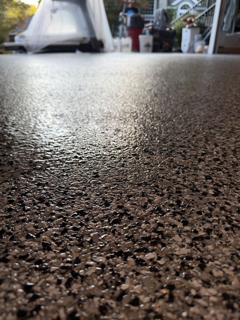 Bronze and black flake epoxy floor close-up