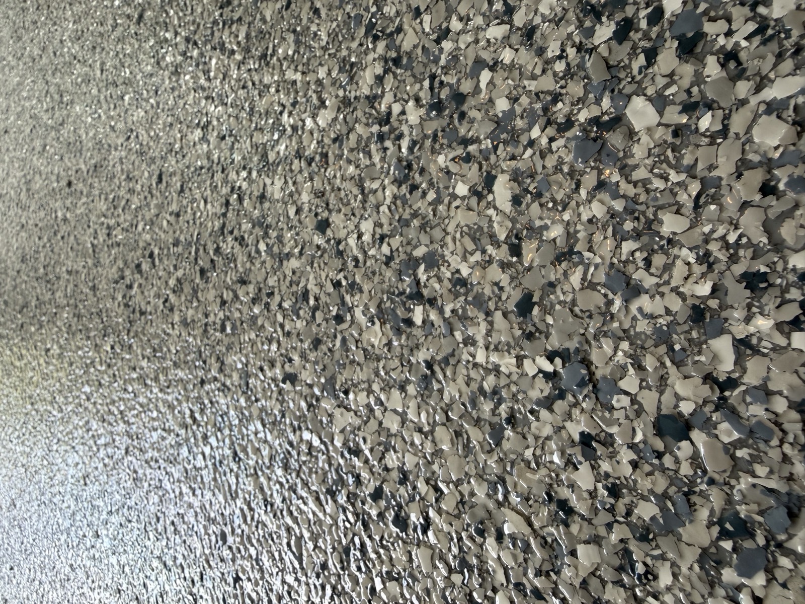 Gray flake epoxy floor texture detail