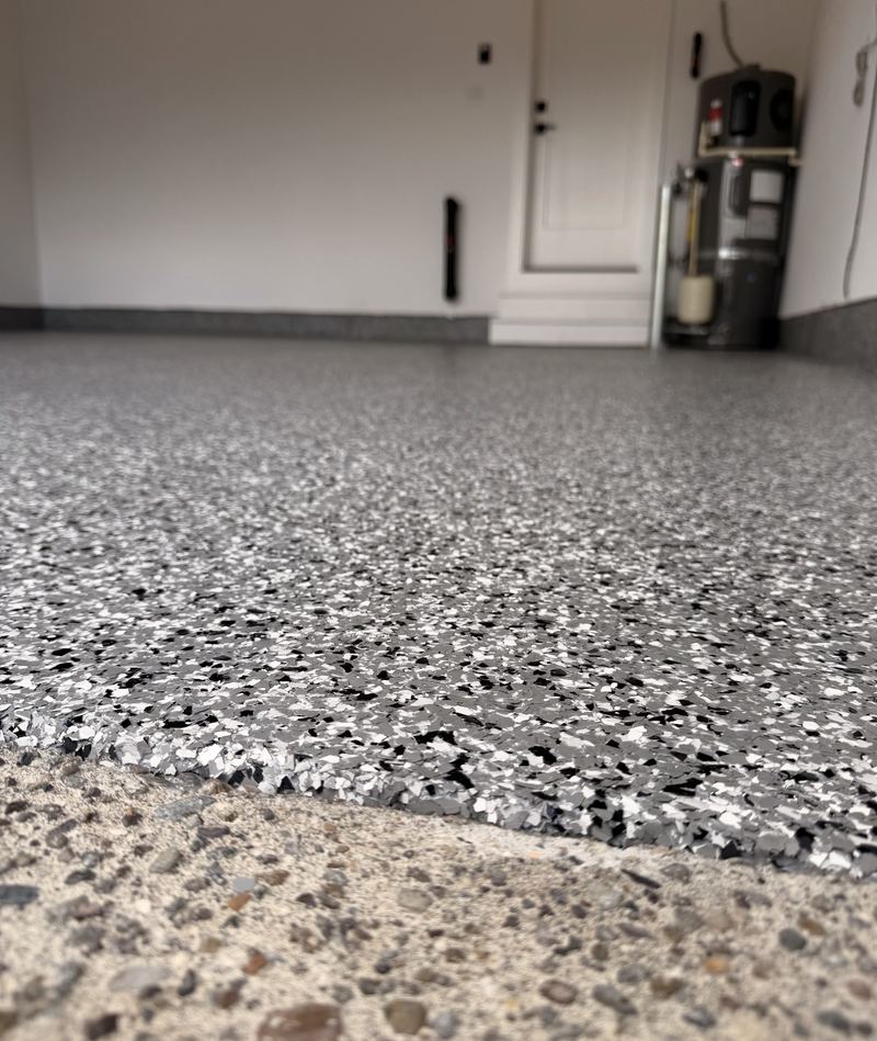 Gray and black flake epoxy floor close-up